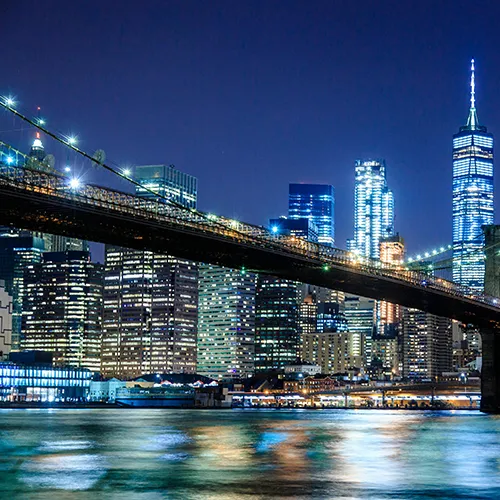 Study in America - Brooklyn Bridge at night connecting education and culture