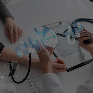 Healthcare professional checking a patient’s vitals during medical consultation