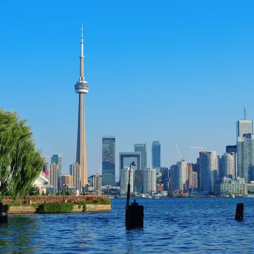 Study abroad in Canada and explore Toronto’s CN Tower surrounded by universities and city life