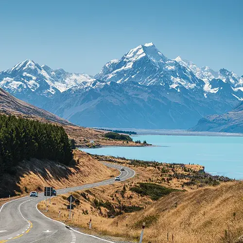Study abroad in New Zealand and discover the road to Mount Cook surrounded by scenic mountains