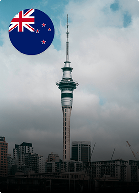 Auckland city skyline with Sky Tower and New Zealand flag icon, representing study in New Zealand.